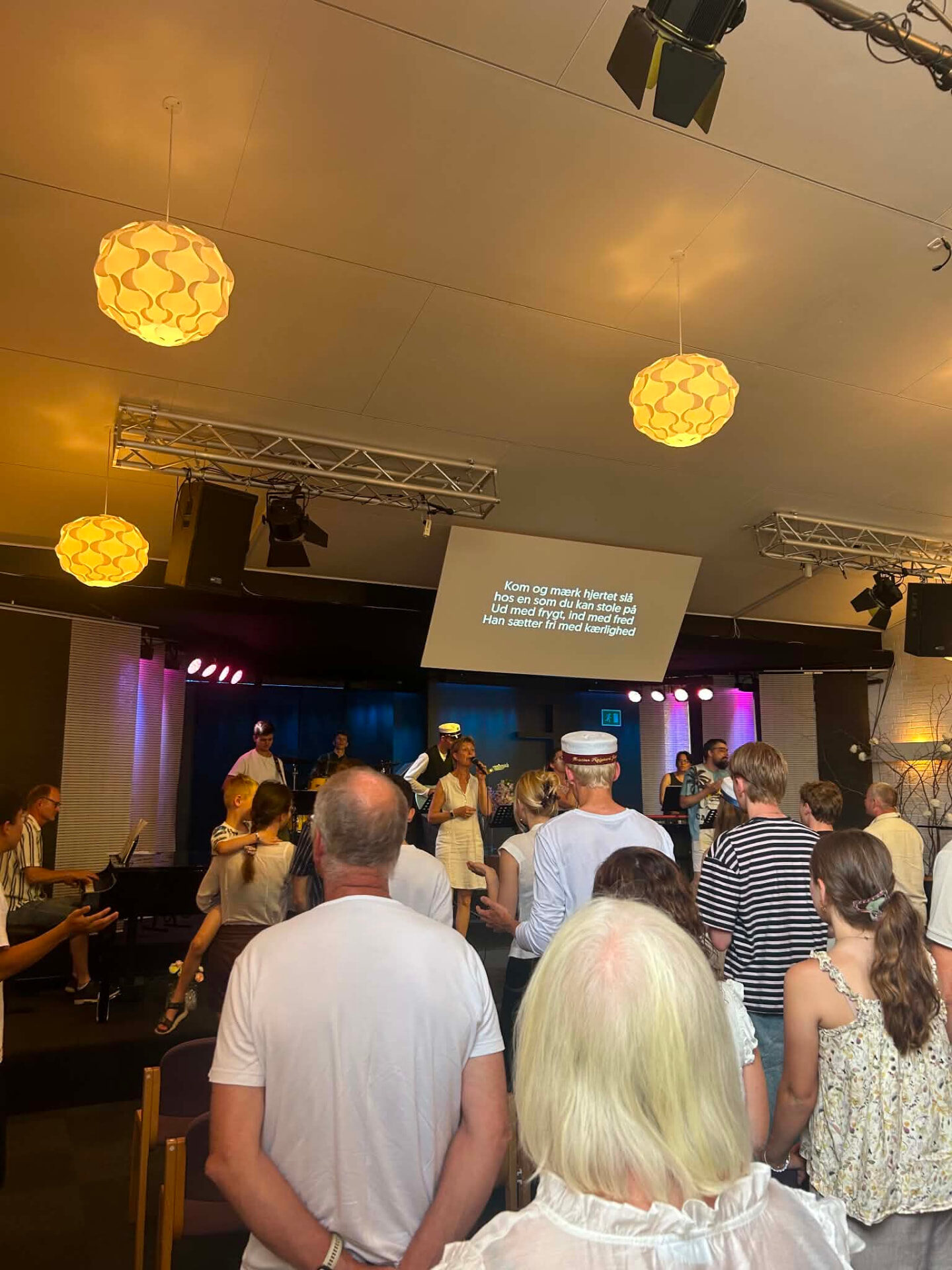 The congregation worshipping together at Bykirken